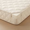 Kids Latex Mattress — close-up of the quilted cover and natural latex core